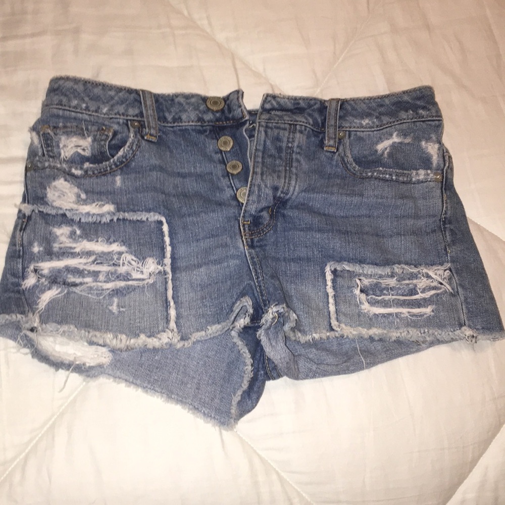 Distressed denim shorts